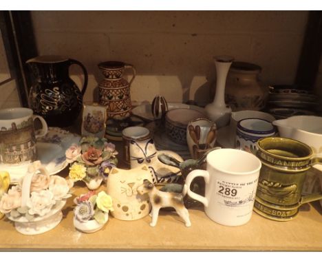 Shelf of mixed ceramics including jugs, vases, mugs etc 