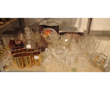 Shelf of mixed glassware including cake plate, decanters, drinking glasses etc 