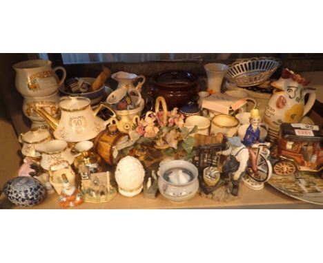 Shelf of mixed ceramics including teapots, jugs, ornaments etc