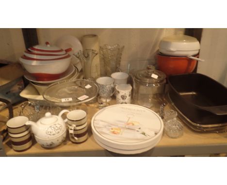 Shelf of glass, ceramics, and plastic kitchenware including mugs, cake stands etc