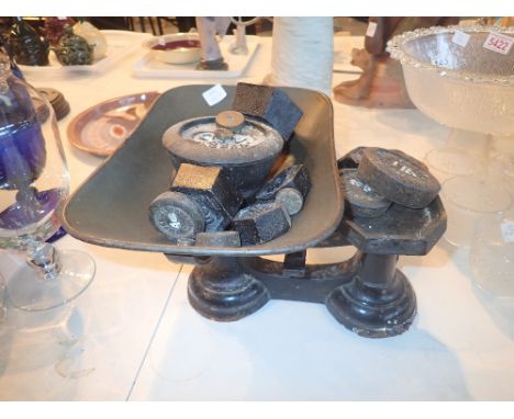 Pair of cast iron scales with weights
