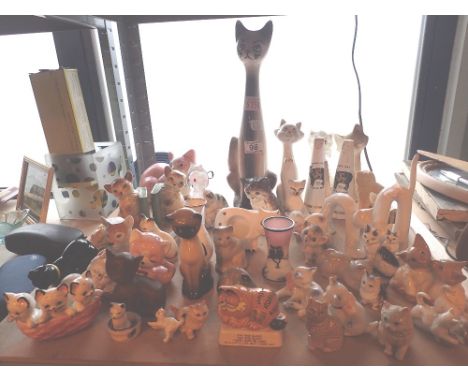 Collection of cats, mostly ceramic, salt and pepper manx cats, Garfield etc