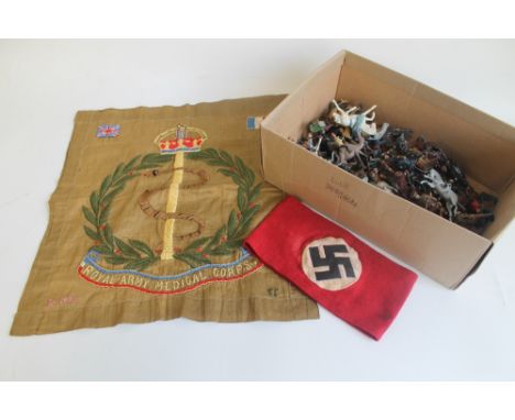 A QUANTITY OF VARIOUS METAL FIGURES TO INCLUDE BRITAINS, together with a NSDAP arm band and a embroidered Royal Army Medical 