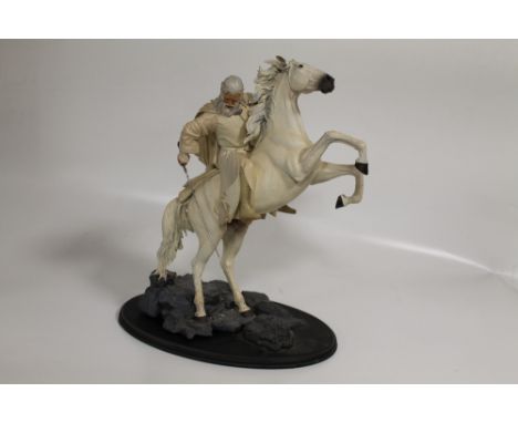 A BOXED SLIDESHOW WETA COLLECTIBLES LORD OF THE RINGS RETURN OF THE KING "GANDALF WITH SHADOWFAX" POLYSTONE STATUE