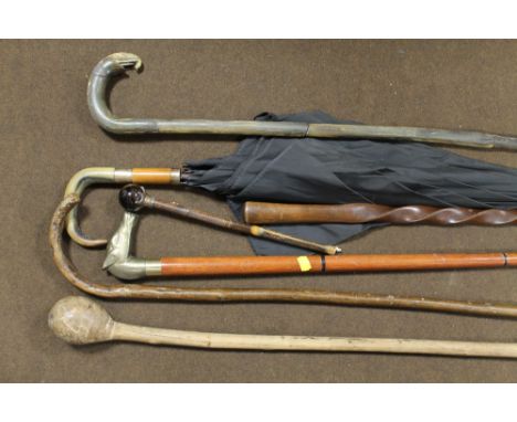 A COLLECTION OF VINTAGE WALKING STICKS, UMBRELLAS ETC, to include a parasol handle with polished stone ball finial (possibly 