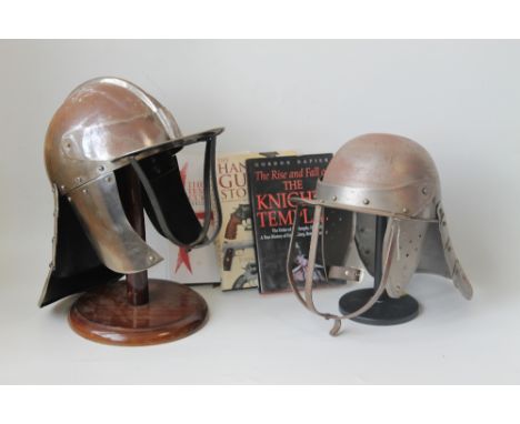 FOUR REPRODUCTION ARMOUR HELMETS, to include two Cromwellian lobster tail types, a medieval crusader style example, and a Gre