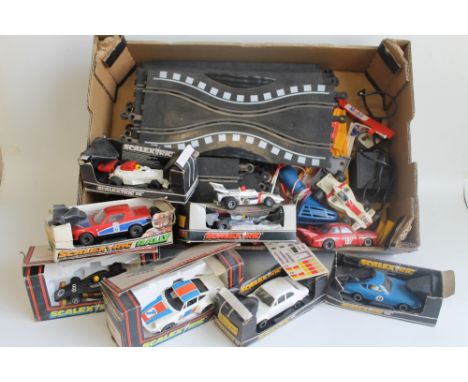 TEN VARIOUS BOXED AND LOOSE SCALEXTRIC VEHICLES, to include c053 Datsun 260Z, c052 Ford Escort Mexico, etc. Together with han