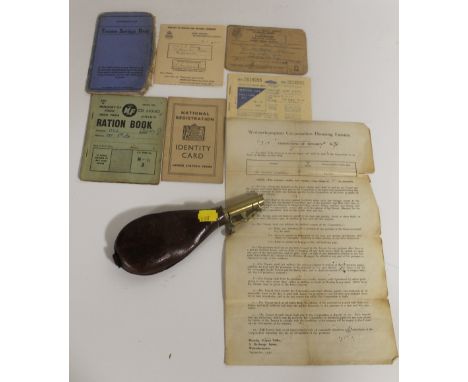 A LEATHER AND BRASS POWDER FLASK, together with various Ration Books, Identity Cards, Petrol Coupons etc