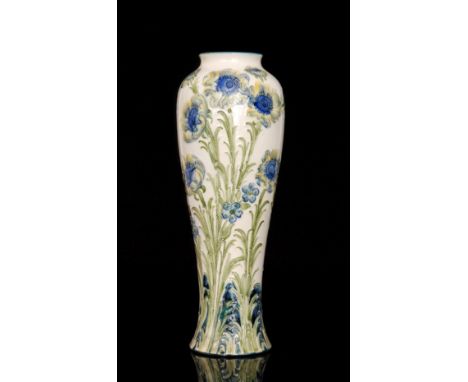 William Moorcroft - A large Florian Ware Poppy pattern vase of tapering form decorated with blue and yellow flowers and folia