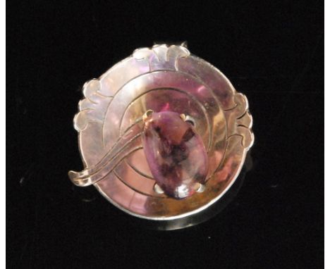Fidencio Serrano - A 1970s Mexican Sterling silver and amethyst pendant brooch,  of circular concave outline with stylised fo