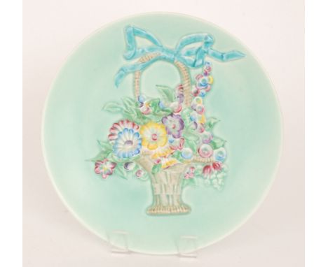 Clarice Cliff - Flower Basket - A large wall plaque circa 1938 relief moulded with a ribbon tied basket filled with flowers, 