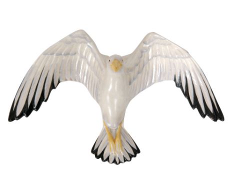 Clarice Cliff - Seagull - A wall pocket circa 1937 modelled in the form of an open winged seagull with enamel painted decorat