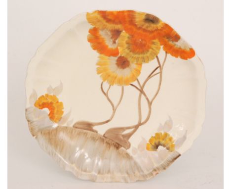 Clarice Cliff - Rhodanthe - An early frill edge plate circa 1926 later hand painted with a stylised tree landscape, Honeyglaz