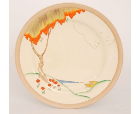 Clarice Cliff - Taormina - A large circular plate circa 1937 hand painted with a stylised tree lined coastal landscape within