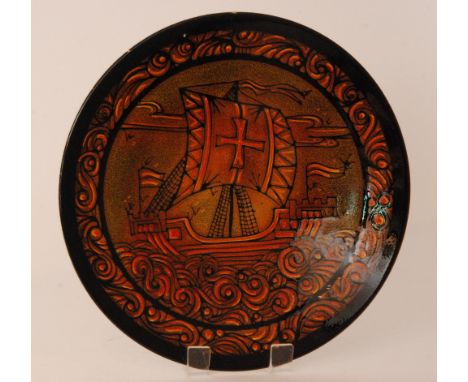 Diana Davis - Poole Pottery - A shape 54 Aegean charger decorated with a galleon at sea, amidst curled waves, all in tones of