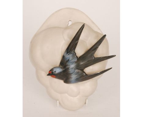 Clarice Cliff - Swallow - A wall pocket circa 1938 in the form of a stylised cloud with an applied swallow in flight picked o