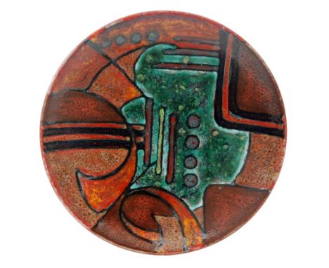 Karen Brown - Poole Pottery - An NN41 pattern charger decorated with abstract motifs in tones of brown and green, some with t