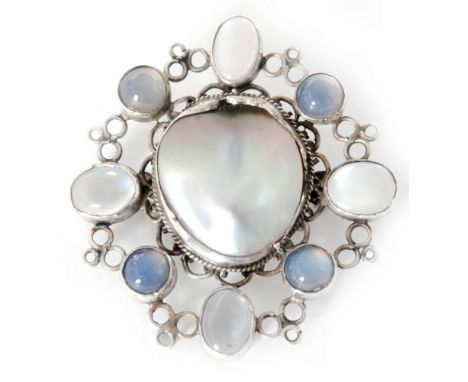 In the manner of Ella Naper - An Arts and Crafts moonstone and blister pearl brooch, the central oval blister pearl in rub ov