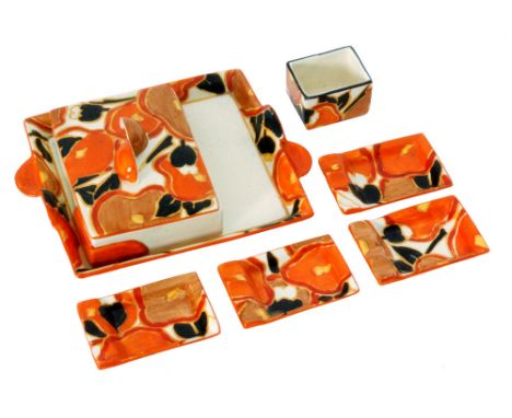 Clarice Cliff - Orange Chintz - A smokers set circa 1932 comprising rectangular lidded box, match holder, four rectangular as