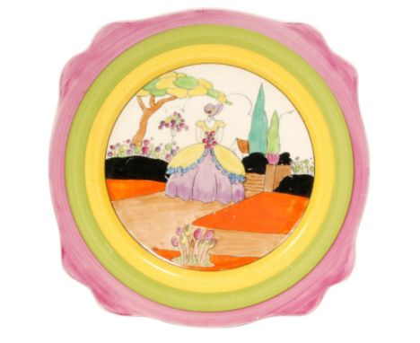 Clarice Cliff - Applique Idyll - A large Leda shape plate circa 1931 hand painted with a Crinoline lady to a garden setting w