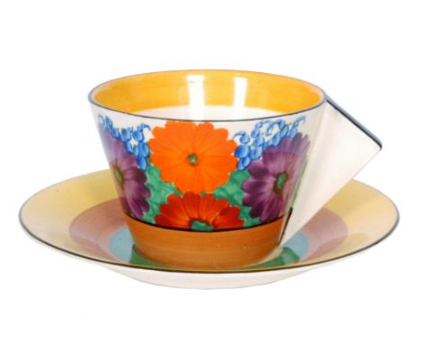 Clarice Cliff - Gayday - A conical cup and saucer circa 1932, hand painted with stylised flowers and foliage with black, yell