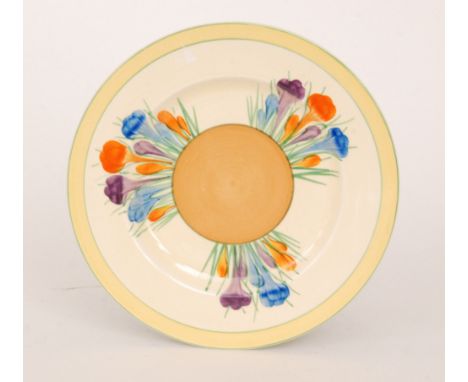 Clarice Cliff - Crocus - A circular side plate circa 1950 radially hand painted with crocus sprays with brown, green and yell