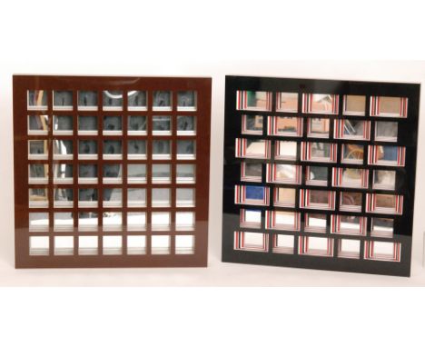 Ruth Spaak - A pair of contemporary wall mirrors constructed from layered coloured acrylic each with multiple small square an