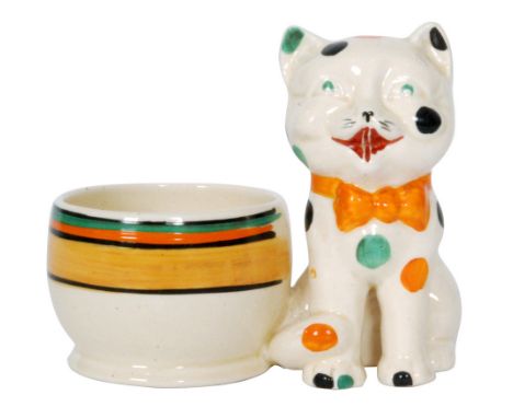 Clarice Cliff - Laughing Cat - A pen holder circa 1932 modelled as a seated cat, hand painted with black, orange and green sp