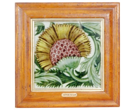 William de Morgan - Merton Abbey - A BBB design 6in plastic clay framed tile decorated with a purple and yellow flower amidst