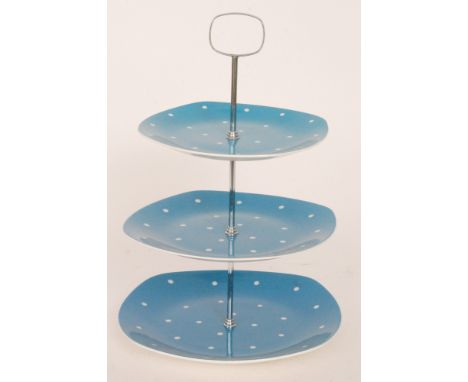 Jessie Tait - Midwinter - A 1950s Stylecraft three tier cake stand decorated in the Blue Domino design with white polka dots 