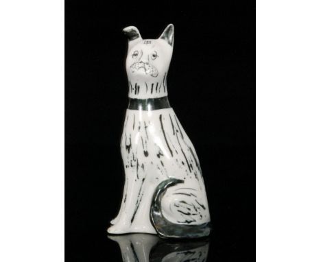 Richard Parkinson - Parkinson Pottery - A model of a seated dog with green detailing, unmarked, height 14cm