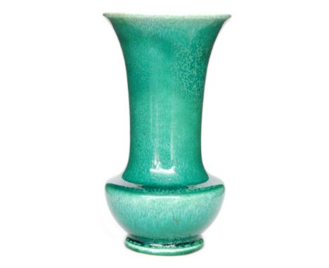 Ruskin Pottery - A souffle glazed vase of footed globe and shaft form glazed in a mottled green, impressed oval West Smethwic