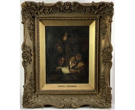 Manner of David Teniers, oil on board, 19th century of figures seated round a table lit by candle light, in gilt frame, 22 x 