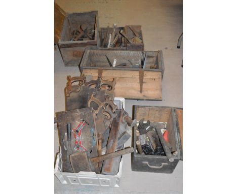 A large collection of vintage hand tools, to include: Saws; hammers; files; mallets; planes; and other tools, in six boxes.