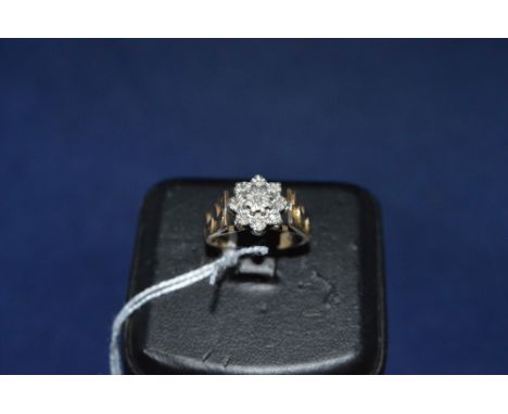 A diamond cluster ring, in illusion setting, on 9ct yellow gold shank, ring size N.