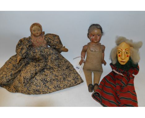 A Twink Addison puppet; together with two antique dolls.