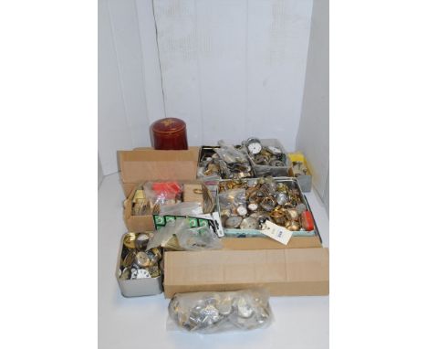 A collection of watch parts, to include: cases; faces; pocket watch parts; empty ring boxes; and watch glass.