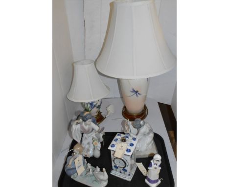 Three Lladro figures; Royal Doulton figurine Anna 2802; A Leonardo clock; and two table lamps, one with Dragon fly decoration