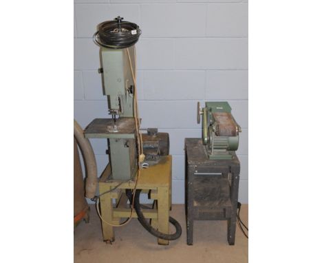 A CABER 12inch band saw, electric motor on hand-built wooden stand; together with an electric belt sander and combined disc s