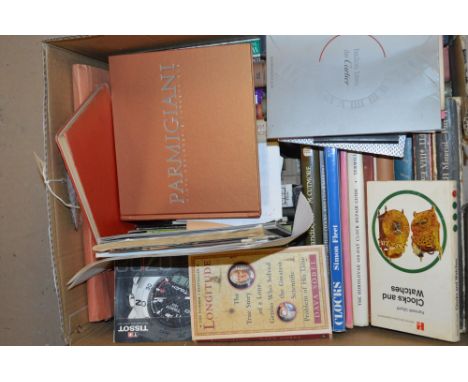 A box of watch books and magazines, to include: Parmigiani; Watch Repair Manual; Longitude; Cartier; and Pocket Watch Handboo