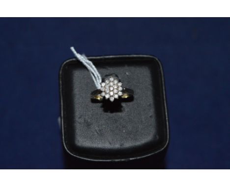 Diamond cluster ring, on 9ct yellow gold shank, ring size N.