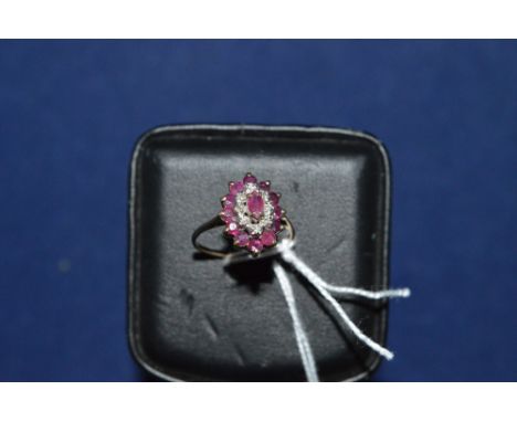 Ruby and diamond cluster ring, on yellow metal shank, ring size M 1/2.
