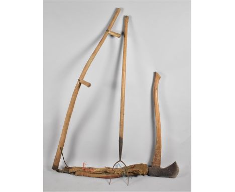 A Collection of Vintage Tools to Include Scythe, Axe and Hay Fork 