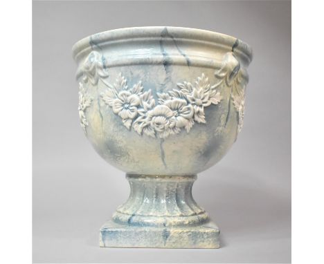 A Modern Ceramic Jardiniere with Relief Floral Decoration to Body and Square Plinth Base, 31cm Diameter and 31cm High 