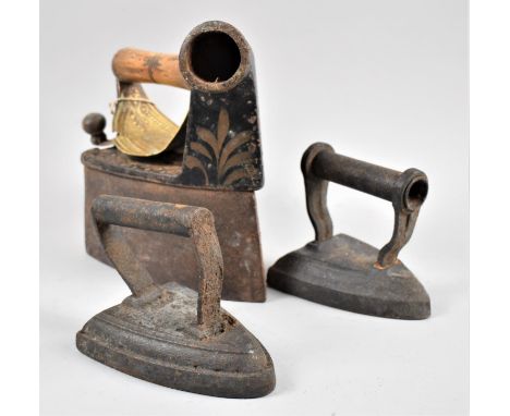 A Collection of Three Vintage Flat Irons 