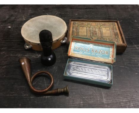 SMALL CARTON WITH TAMBOURINE, ROLLS RAZOR, WOODEN ETHNIC FIGURE &amp; A VINTAGE BOX OF RICHTERS DESIGN FOR ARCHITECTURAL MODE