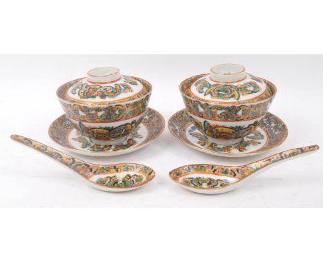 A pair of early 20th century circa 1920s Chinese Oriental hand painted porcelain tea bowls with lids &amp; saucers, together 