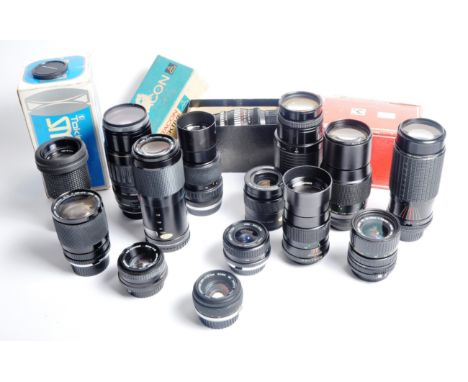 A mixed collection of 14 x camera lenses. Models are: Sigma AF-1 75-300mm f4.5-5.6, Pentacon 135mm f2.8, Sigma 80-200mm f3.5-
