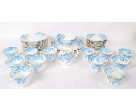 A Victorian 19th century blue &amp; white bone china 'H. M. Williamson &amp; Sons' twelve people tea set. The service includi