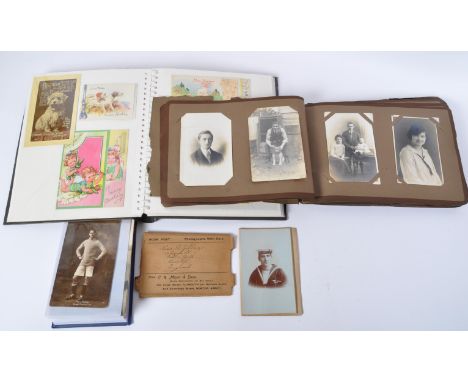 A collection of 19th century, Edwardian and 20th century postcards and photographs to include a series of black and white por